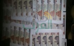 بالصور.. أمن القاهرة يضبط صاحب مكتب دعاية بحوزته أموال مزورة