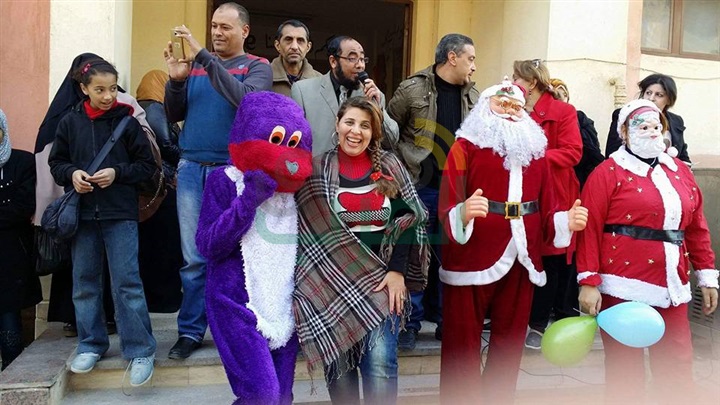 بالصور.. مدرسة " الشهيد إسلام الرسمية " بنجع حمادي تحتفل بـ"الكريسماس"