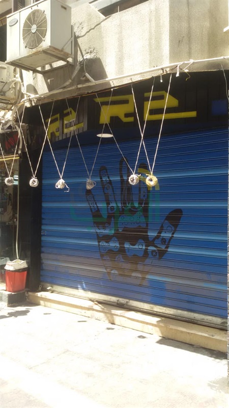 غلق وتشميع المحلات المخالفة بالإسكندرية 