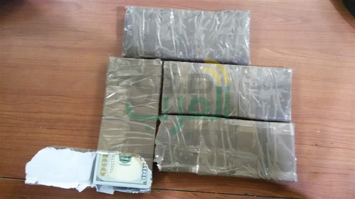 ضبط راكبة حاولت تهريب أموال داخل شكيولاته إلى بانكوك 