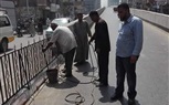 للحد من وقوع الحوادث.. تركيب سور حديدى بمطلع كوبرى نجع حمادى العلوى