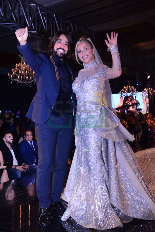 بالصور.. نيكول سابا تتألق بفستان زفاف بـ200 مليون جنيه في ختام ديفيليه هاني البحيري بالصور.. نيكول سابا تتألق بفستان زفاف بـ200 مليون جنيه في ختام ديفيليه هاني البحيري