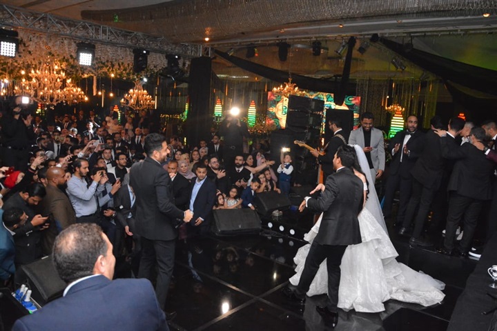 بالصور.. حماقي يشعل زفاف "تريزيجيه" وسط نجوم الفن والرياضة والمشاهير بالصور.. حماقي يشعل زفاف "تريزيجيه" وسط نجوم الفن والرياضة والمشاهير