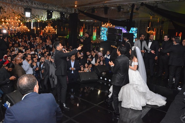 بالصور.. حماقي يشعل زفاف "تريزيجيه" وسط نجوم الفن والرياضة والمشاهير بالصور.. حماقي يشعل زفاف "تريزيجيه" وسط نجوم الفن والرياضة والمشاهير