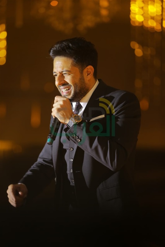 بالصور.. حماقي يتألق بحفل كامل العدد في رأس السنة ويشعل أجواء البهجة بأغانية المميزة بالصور.. حماقي يتألق بحفل كامل العدد في رأس السنة ويشعل أجواء البهجة بأغانية المميزة