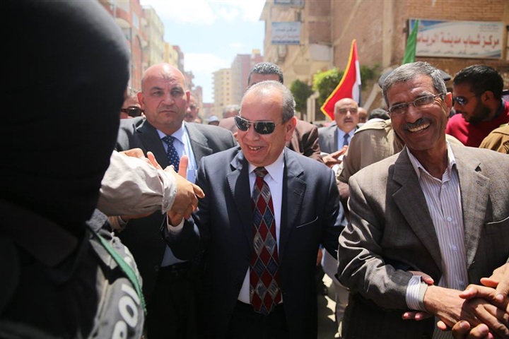 بالصور.. طوابير كفر الشيخ تحت ظل "العلم" وتصويت علي هتافات "تحيا مصر"