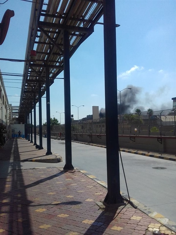 الحماية المدنية: 5 سيارات إطفاء تسيطر علي  حريق بمحيط شركة أدوية بالهرم