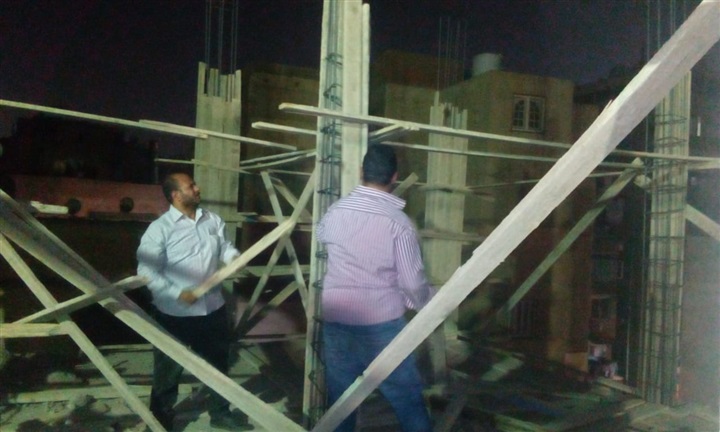 إزالة شدة خشبية مخالفة خلف مستشفي الشرطة بالعجوزة