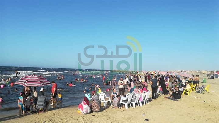 بالصور.."فرحة العيد" بكفر الشيخ تنتصر علي حرارة الشمس في الحدائق والمنتزهات ومصيف بلطيم