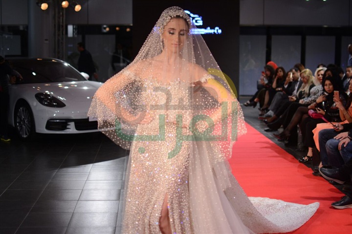 بالصور .. هاني البحيري يطلق عرض أزياء مع سيارة "بورش" بالصور .. هاني البحيري يطلق عرض أزياء مع سيارة "بورش"