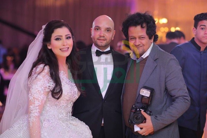 بالصور.. تامر حسني والليثي يشعلان زفاف مصطفى ومنة بالصور.. تامر حسني والليثي يشعلان زفاف مصطفى ومنة
