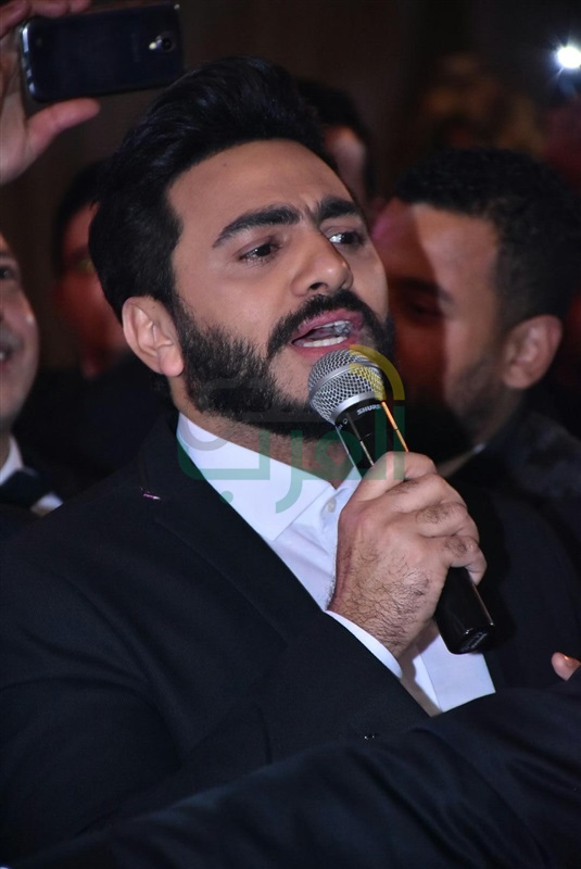 بالصور.. تامر حسني والليثي يشعلان زفاف مصطفى ومنة بالصور.. تامر حسني والليثي يشعلان زفاف مصطفى ومنة