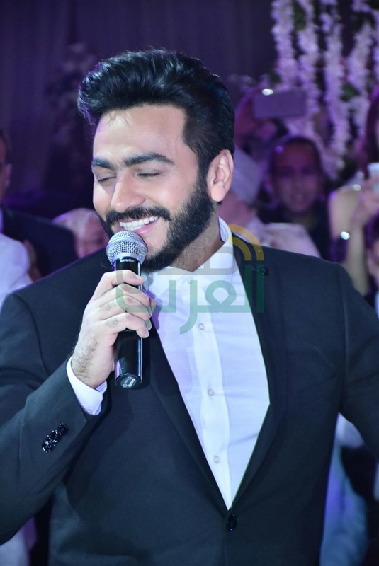 بالصور.. تامر حسني والليثي يشعلان زفاف مصطفى ومنة بالصور.. تامر حسني والليثي يشعلان زفاف مصطفى ومنة