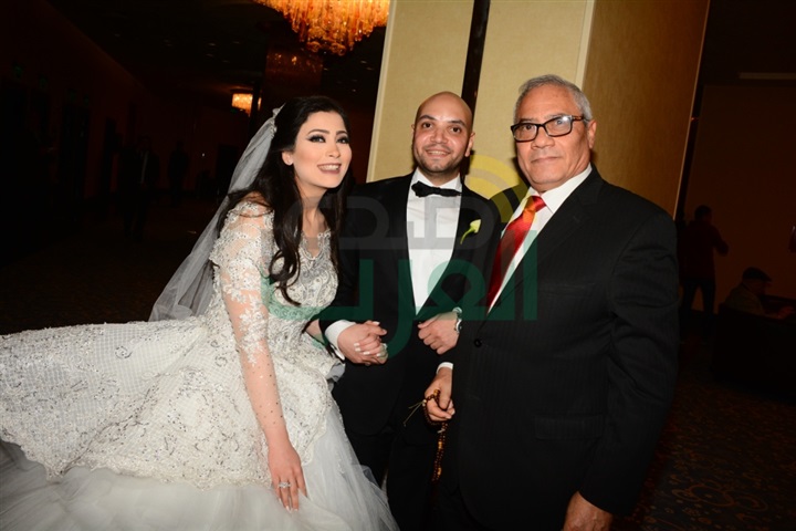 بالصور.. تامر حسني والليثي يشعلان زفاف مصطفى ومنة بالصور.. تامر حسني والليثي يشعلان زفاف مصطفى ومنة