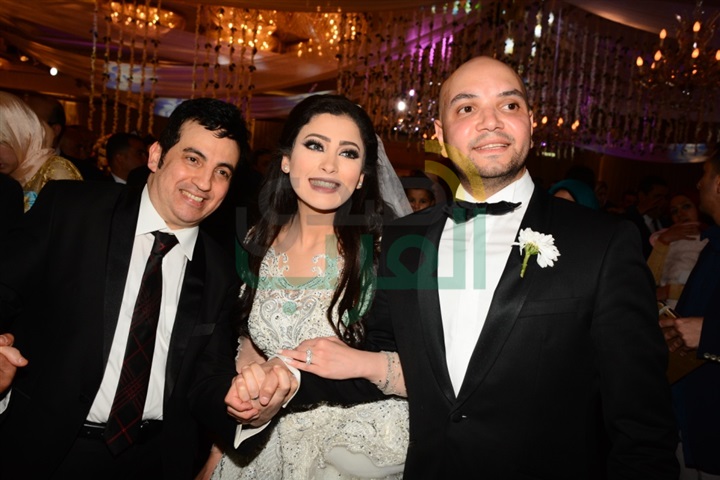 بالصور.. تامر حسني والليثي يشعلان زفاف مصطفى ومنة بالصور.. تامر حسني والليثي يشعلان زفاف مصطفى ومنة
