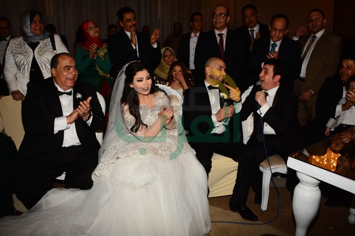 بالصور.. تامر حسني والليثي يشعلان زفاف مصطفى ومنة بالصور.. تامر حسني والليثي يشعلان زفاف مصطفى ومنة