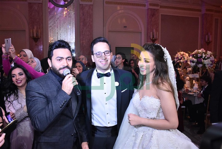 بالصور .. تامر حسنى وأحمد عصام يشعلون زفاف محمد ونورهان بحضور نجوم الفن بالصور .. تامر حسنى وأحمد عصام يشعلون زفاف محمد ونورهان بحضور نجوم الفن