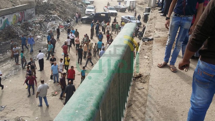 بالصور.. سقوط أتوبيس رحلات من أعلى الدائري وإصابة 6