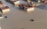 أمن الجيزة يستعين باللنشات لإنقاذ المتضررين من الأمطار في الصف