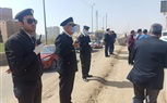 بالصور.. رفع آثار انقلاب سيارة نقل أعلى الطريق الدائرى.. وعودة الحركة المرورية