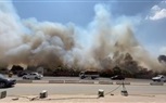 بالصور.. 5 سيارات إطفاء تسيطر علي حريق في حديقة بميدان الرماية 