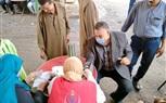 فحص الناخبين قبل الادلاء بأصواتهم في اللجان بكفر الشيخ