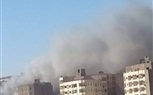 بالصور.. أمن الجيزة يخلى عقارا من السكان بسبب حريق مصنع ومخزن أحذية في فيصل