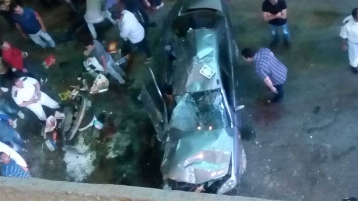 بالصور.. سقوط سياره من أعلى كوبري أكتوبر يسفر عن إصابة شخصين