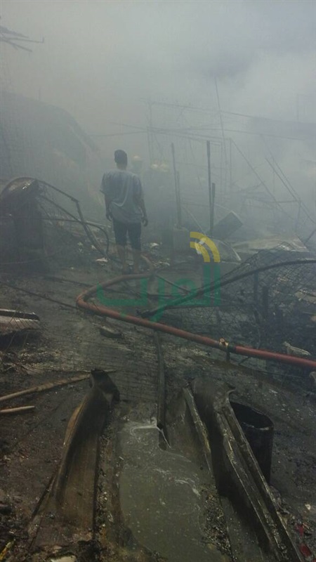 بالصور.. تفحم عددا من المحال التجارية والبضائع في حريق "سوق إمبابة".. و14 سيارة إطفاء لإخماد النيران