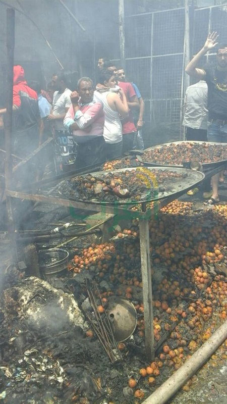 بالصور.. تفحم عددا من المحال التجارية والبضائع في حريق "سوق إمبابة".. و14 سيارة إطفاء لإخماد النيران