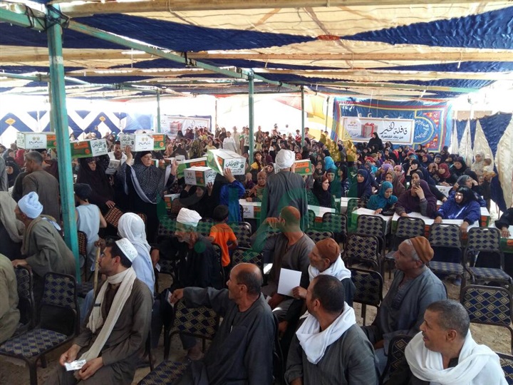 بنك القاهرة والأورمان يوزعان كراتين رمضان على الغير قادرين