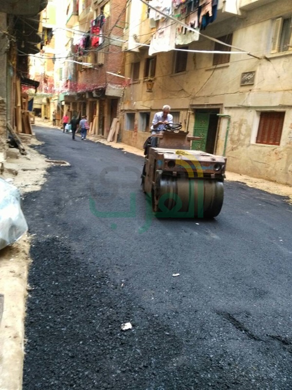 رصف وتنظيف الطرق بنطاق حي الجمرك 