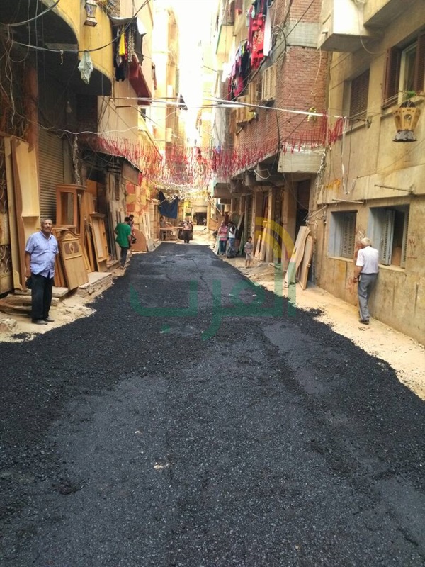 رصف وتنظيف الطرق بنطاق حي الجمرك 