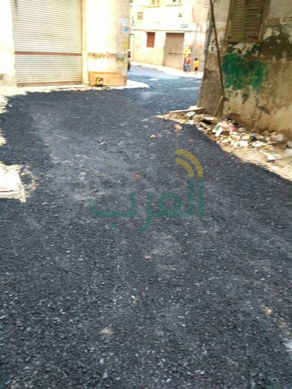 رصف وتنظيف الطرق بنطاق حي الجمرك 