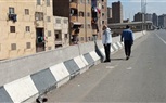 حي العمرانية يتابع أعمال دهان العقارات المطلة على الدائري 