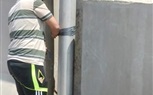  تأمين اعمدة الاناره وغلق الابواب  أعلى محور الفريق كمال عامر 