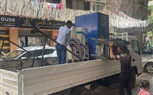 رفع محتويات سنتر بشارع ناصر الثورة بالعمرانية