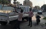 إيقاف أعمال تركيب إعلان بدون تصريح بشارع الهرم