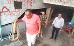 تحرير محضر رش مياه لجراج بشارع عثمان محرم 