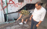 تحرير محضر رش مياه لجراج بشارع عثمان محرم 