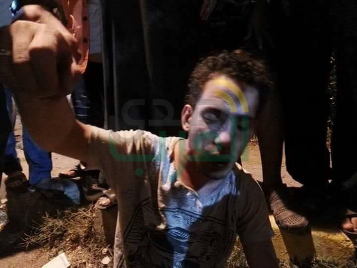 بالصور.."علقة موت"لحرامى سيارات فى بنها