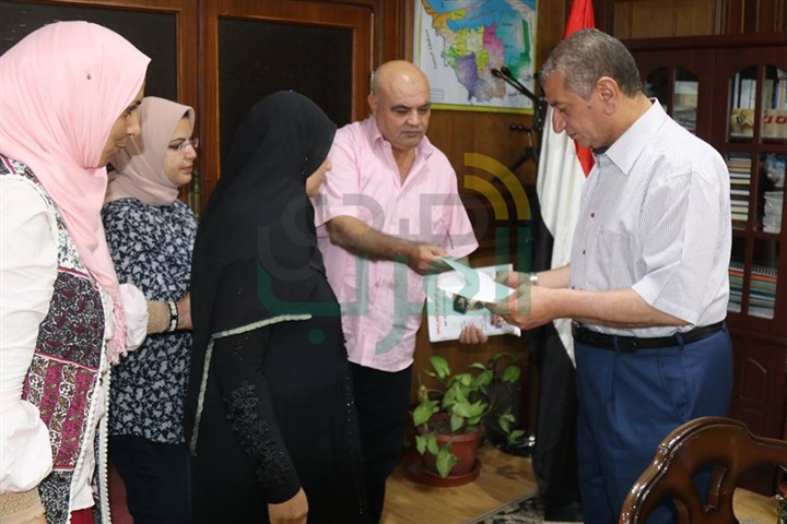  بالصور.. رحلتي عمرة و20 آلف جنيه لأسرة شهيدي الجيش والشرطة بكفر الشيخ