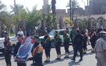 بالصور.. الآلاف يشيعون شهيد الشرطة بقنا يتقدمهم المحافظ ومدير الأمن