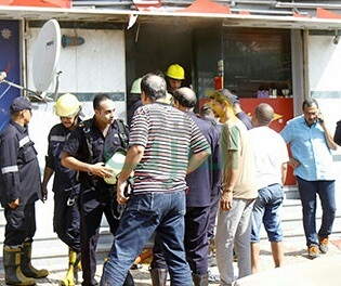 "ماس كهربائي" سبب حريق سوبر ماركت شهير بالدقي