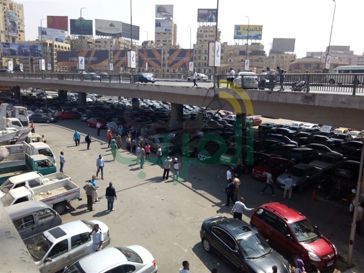 بالصور.. سقوط جزء من سور كوبري أكتوبر إثر تصادم سيارتين