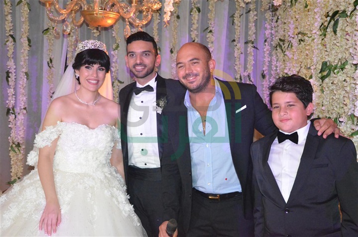 بالصور.. دينا وسعد والعسيلى وبوسى يشعلون حفل زفاف شادى و كرستين 