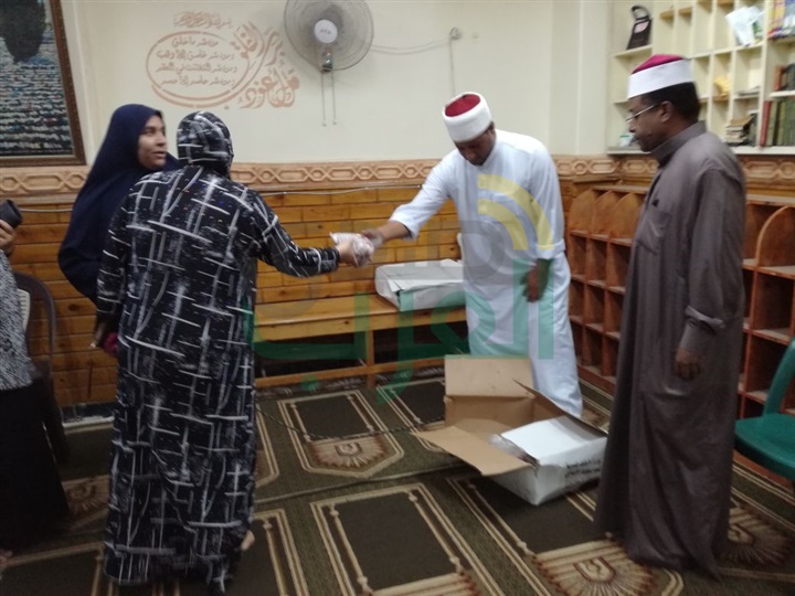 قافلة الخير لتوزيع لحوم الأضاحى تدخل الفرحة على أهالى شارع صفر بنجع العرب 