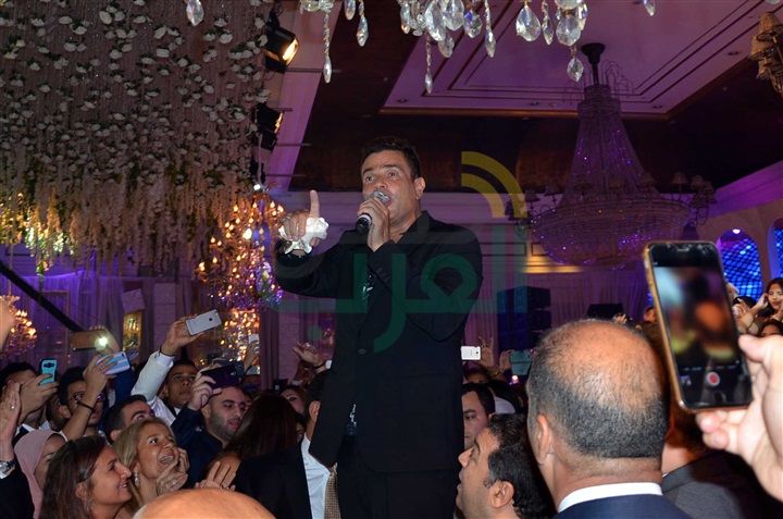 بالصور.. عمرو دياب ونيكول سابا يشعلان زفاف "يارا الزمتي" و"مصطفى إدريس" بالصور.. عمرو دياب ونيكول سابا يشعلان زفاف "يارا الزمتي" و"مصطفى إدريس"