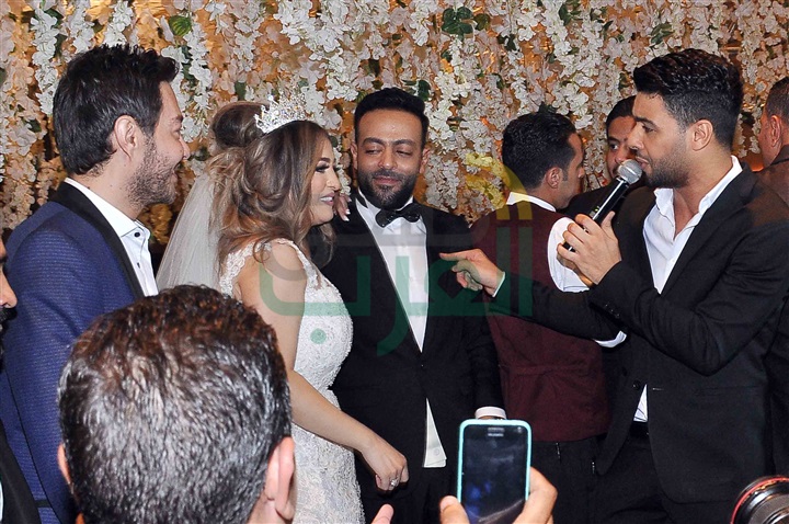 بالصور.. جنات ورامي جمال ودياب يشعلون زفاف "تامر عاشور" بالصور.. جنات ورامي جمال ودياب يشعلون زفاف "تامر عاشور"