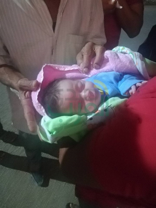 بالصور.. البحث عن ''منتقبة'' ألقت طفل رضيع بعمارة بكفر الشيخ